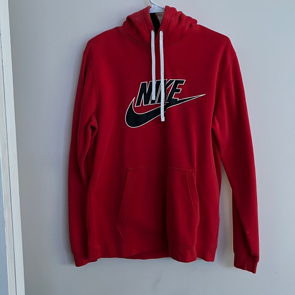 Red Nike Sweatshirt with Black Nike Logo.